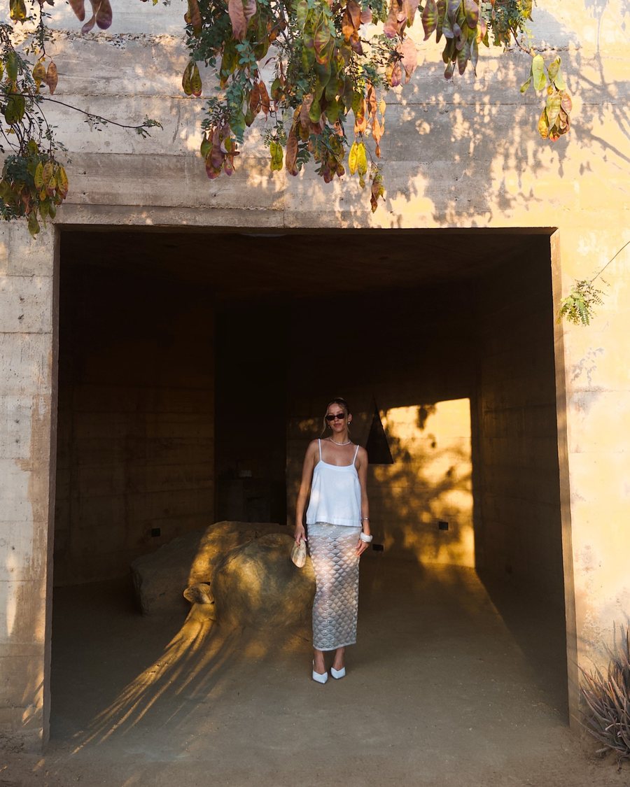 Asha in a concrete doorway at Hotel Terrestre, Puerto Escondido