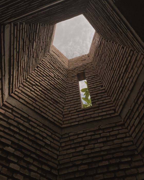 Looking up through the brick light well