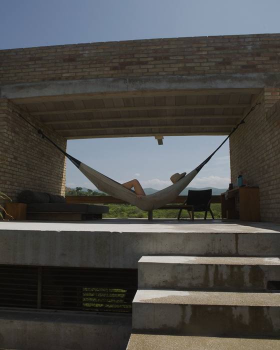 A hammock strung across the terrace