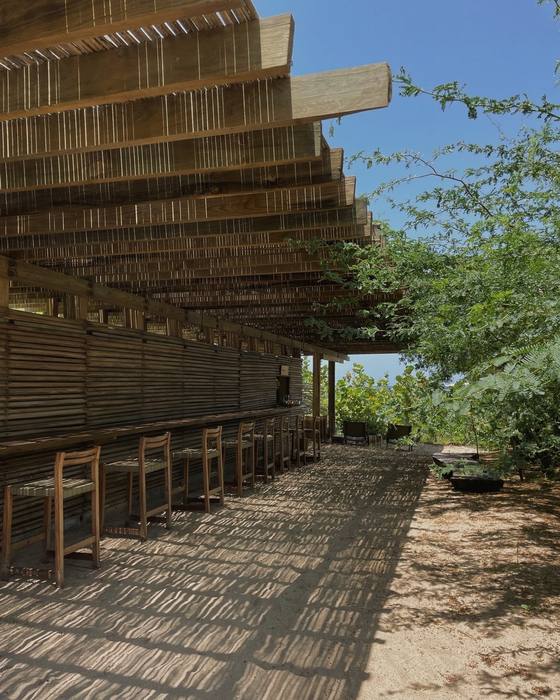 The timber bar under its slatted roof